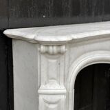 Louis XV style fireplace in Carrara marble