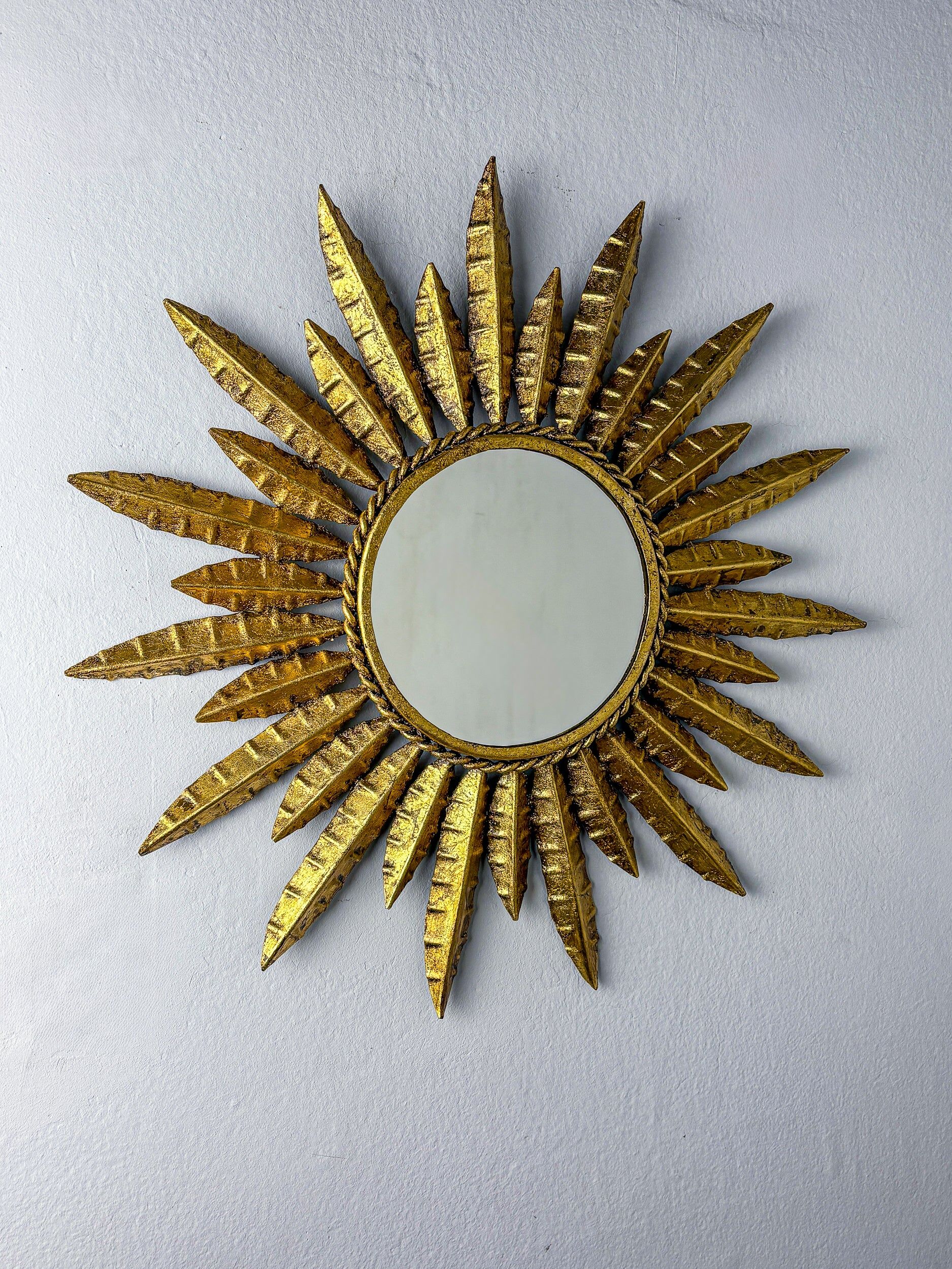 Midcentury modern sunburst wall mirror – gilt metal, France 1960s