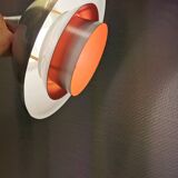 Danish hanging lamp in silver-coloured aluminium with contrasting orange lacquer inside.