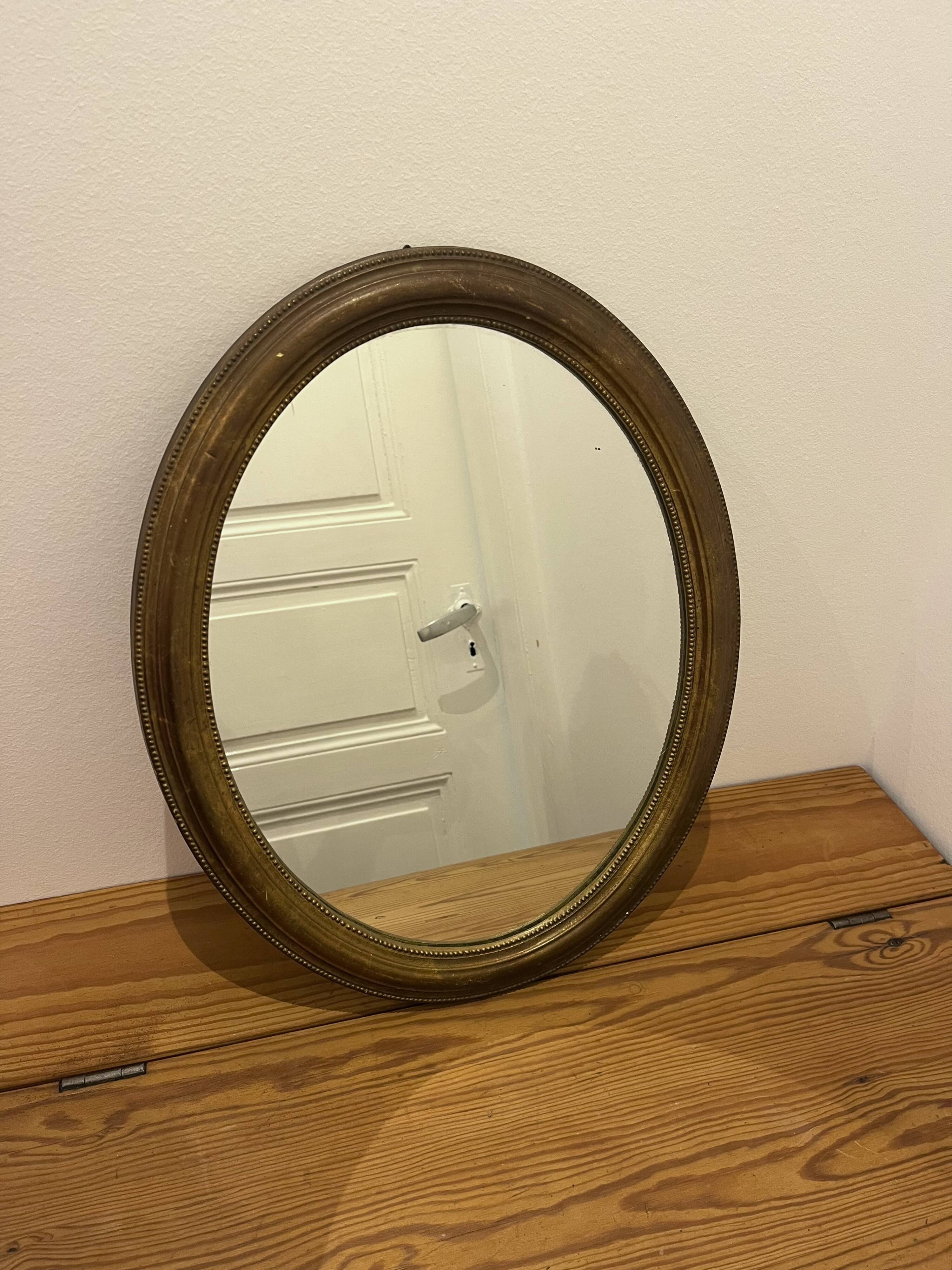 Oval mirror