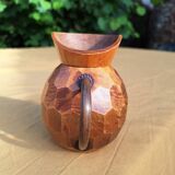 Small faceted wooden pitcher