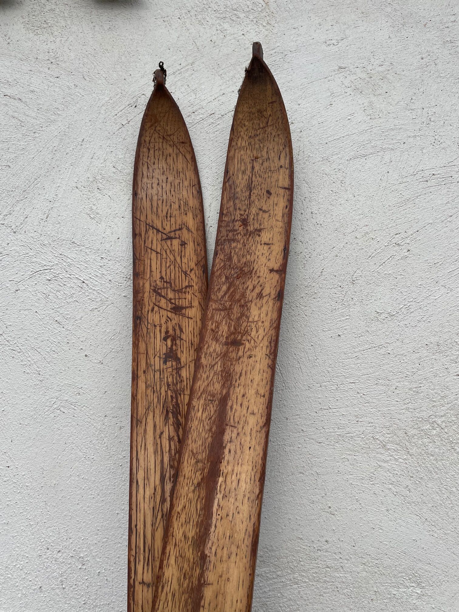 Wooden ski and its sticks