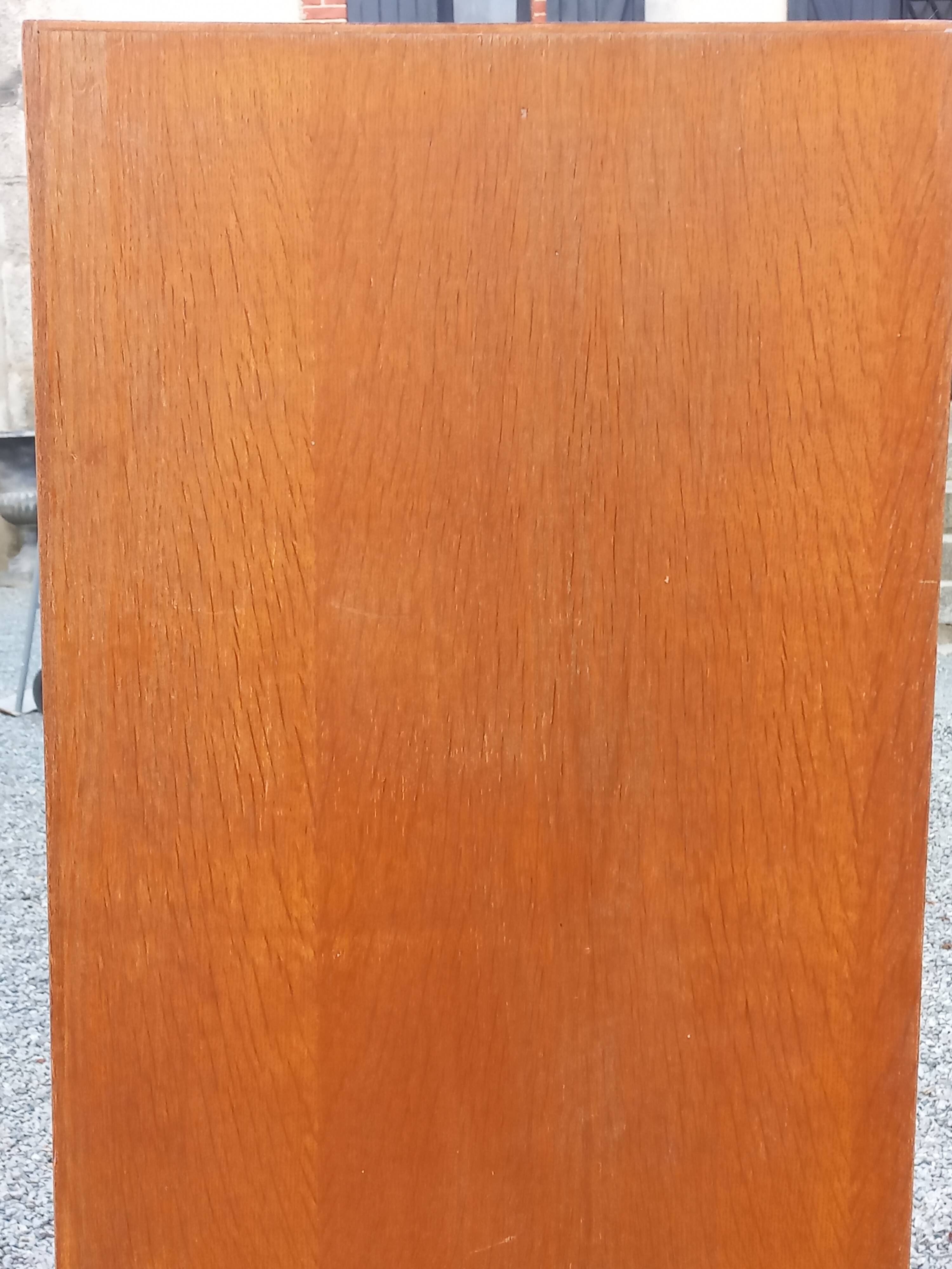Vintage oak wardrobe with metal legs from the 1950s.