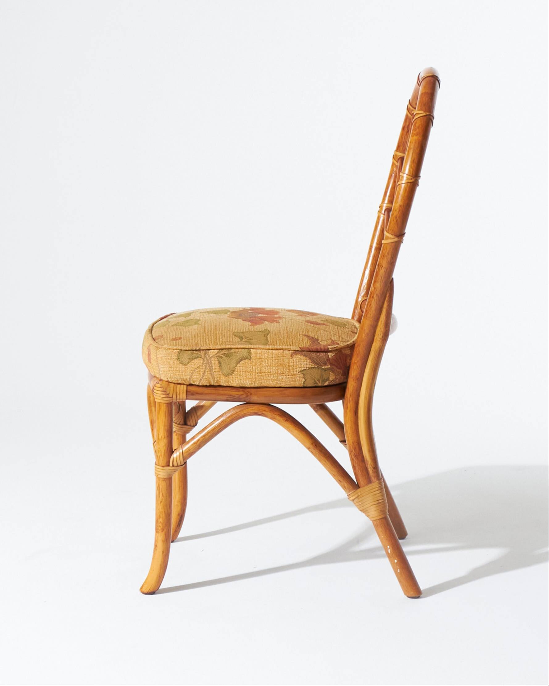 Set of 4 rattan and floral fabric chairs