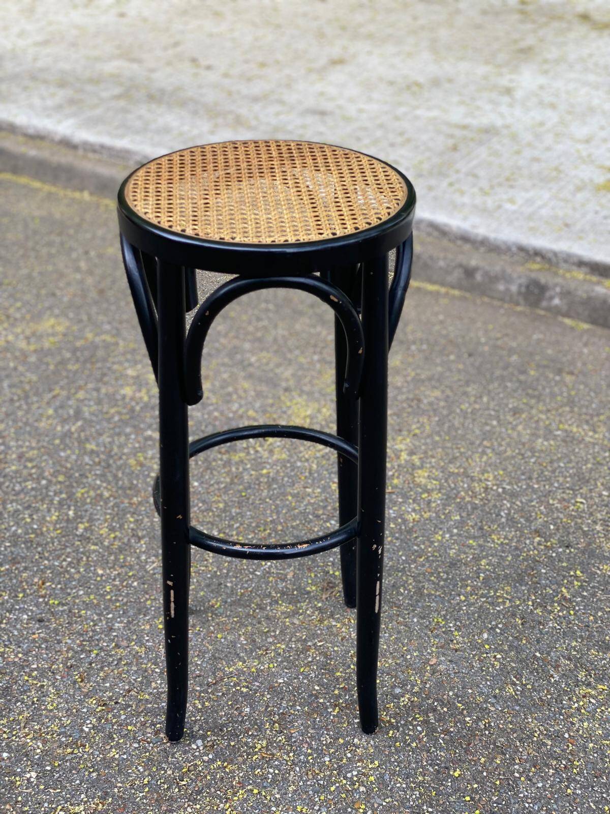 High curved black caned wooden bistro bar stool