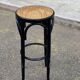 High curved black caned wooden bistro bar stool