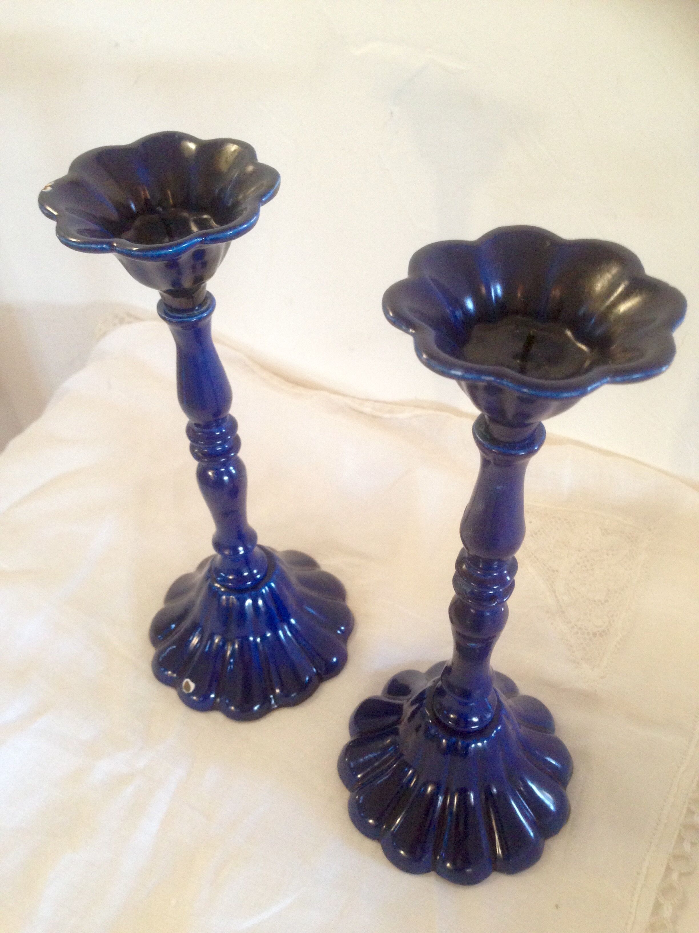 Vintage enameled cast-iron candleholders