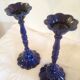 Vintage enameled cast-iron candleholders