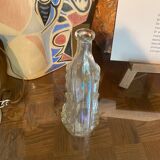 Shell bottle in molded glass