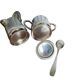 Two small silver-plated metal tea service pots from the 20th century.