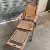 Vintage wooden and cane chaise longue