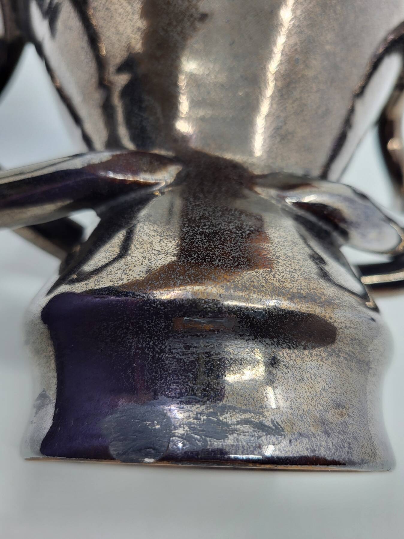 Jean Austruy ear vase in metallic black ceramic, France 1950.