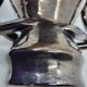 Jean Austruy ear vase in metallic black ceramic, France 1950.