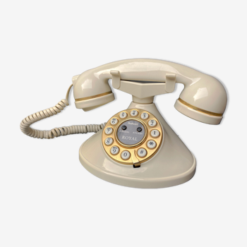 Telephone with ecru and gold design shape