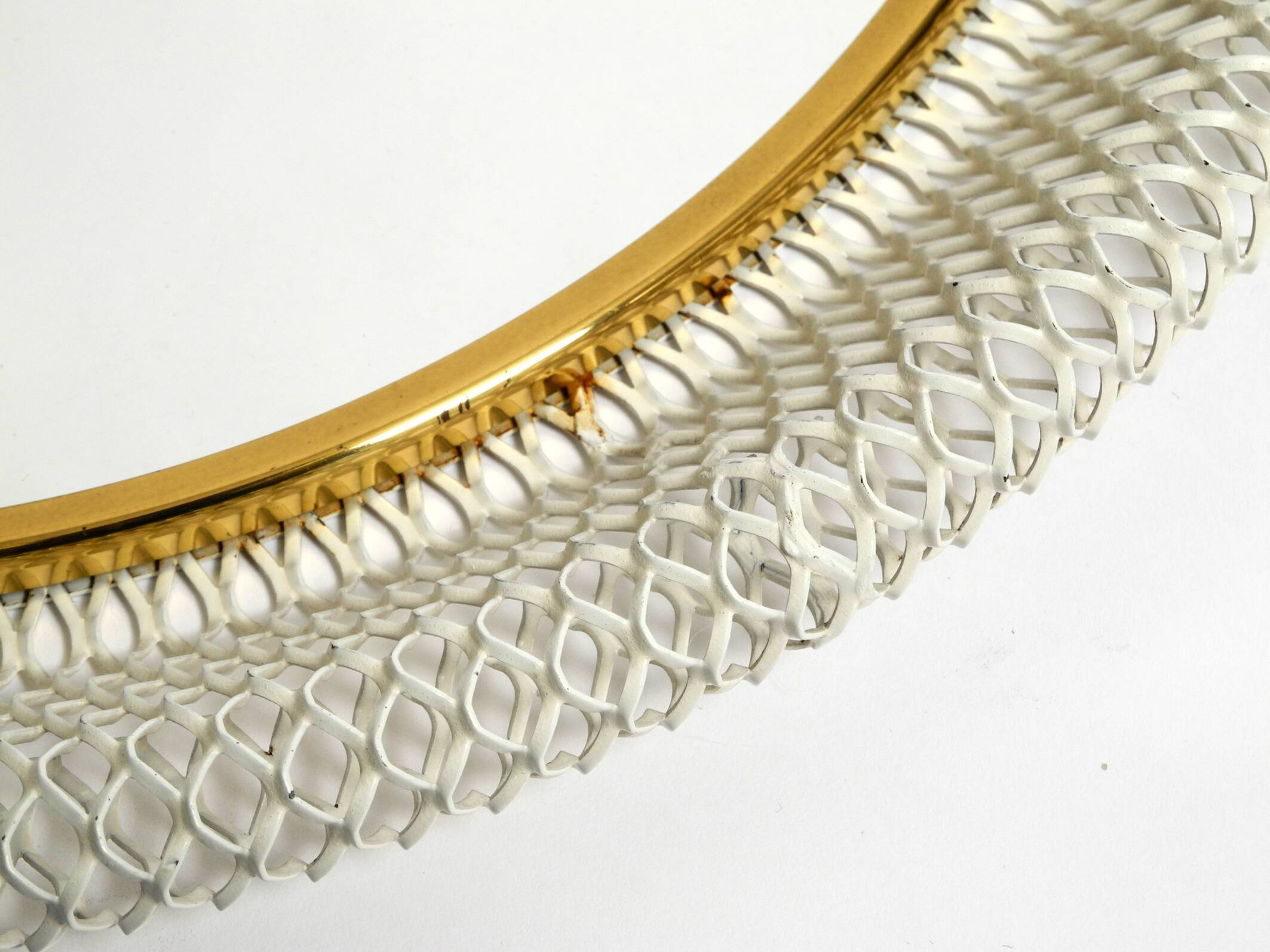 Pair of Mid Century wall mirrors with brass rim and white metal frames