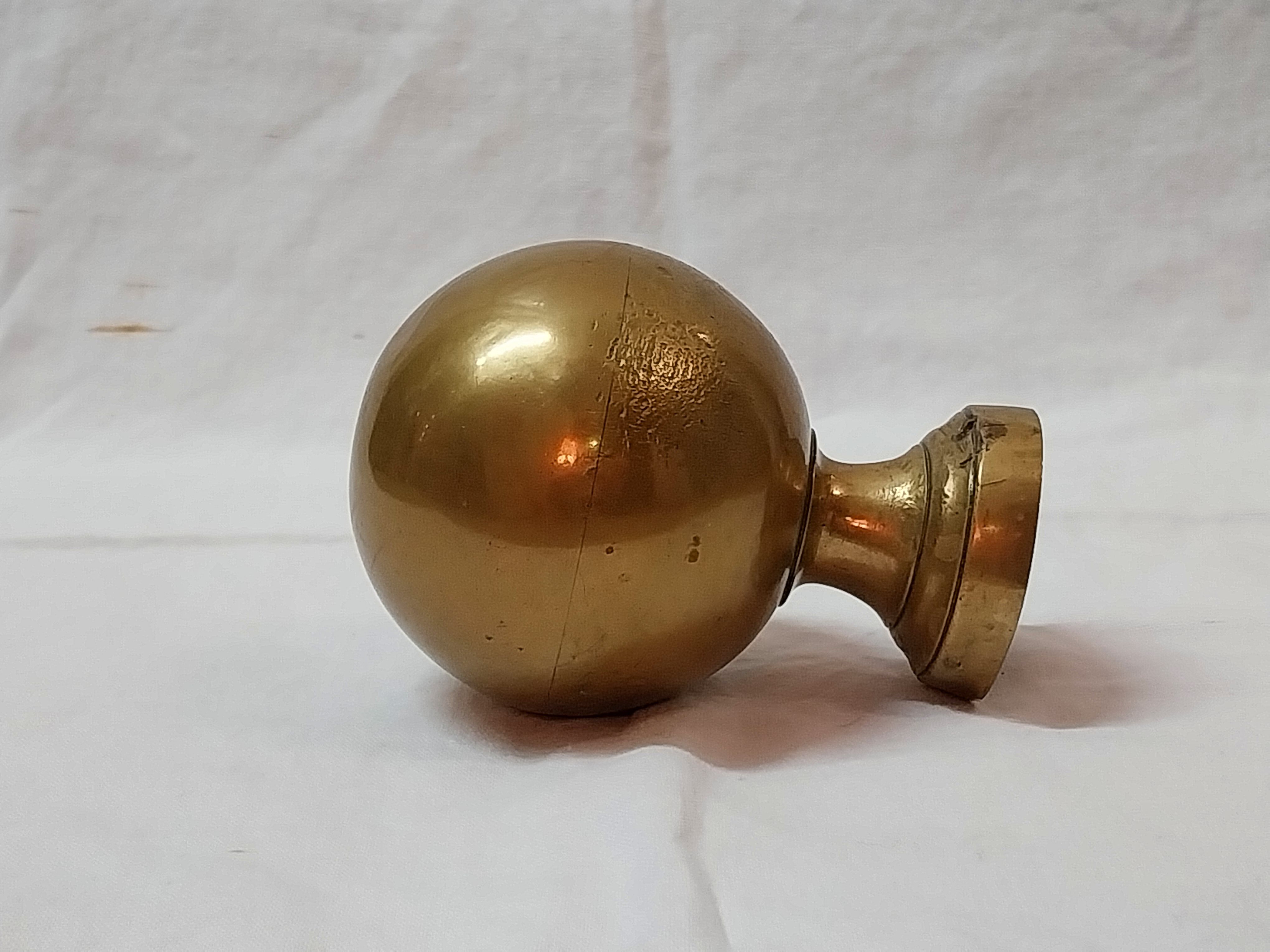 Golden brass stair ball