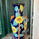 Ceramic vase with sunflowers