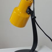 A pair of well-designed minimalist bedside lamps.