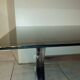Table basse en métal chromé et verre fumé 1970