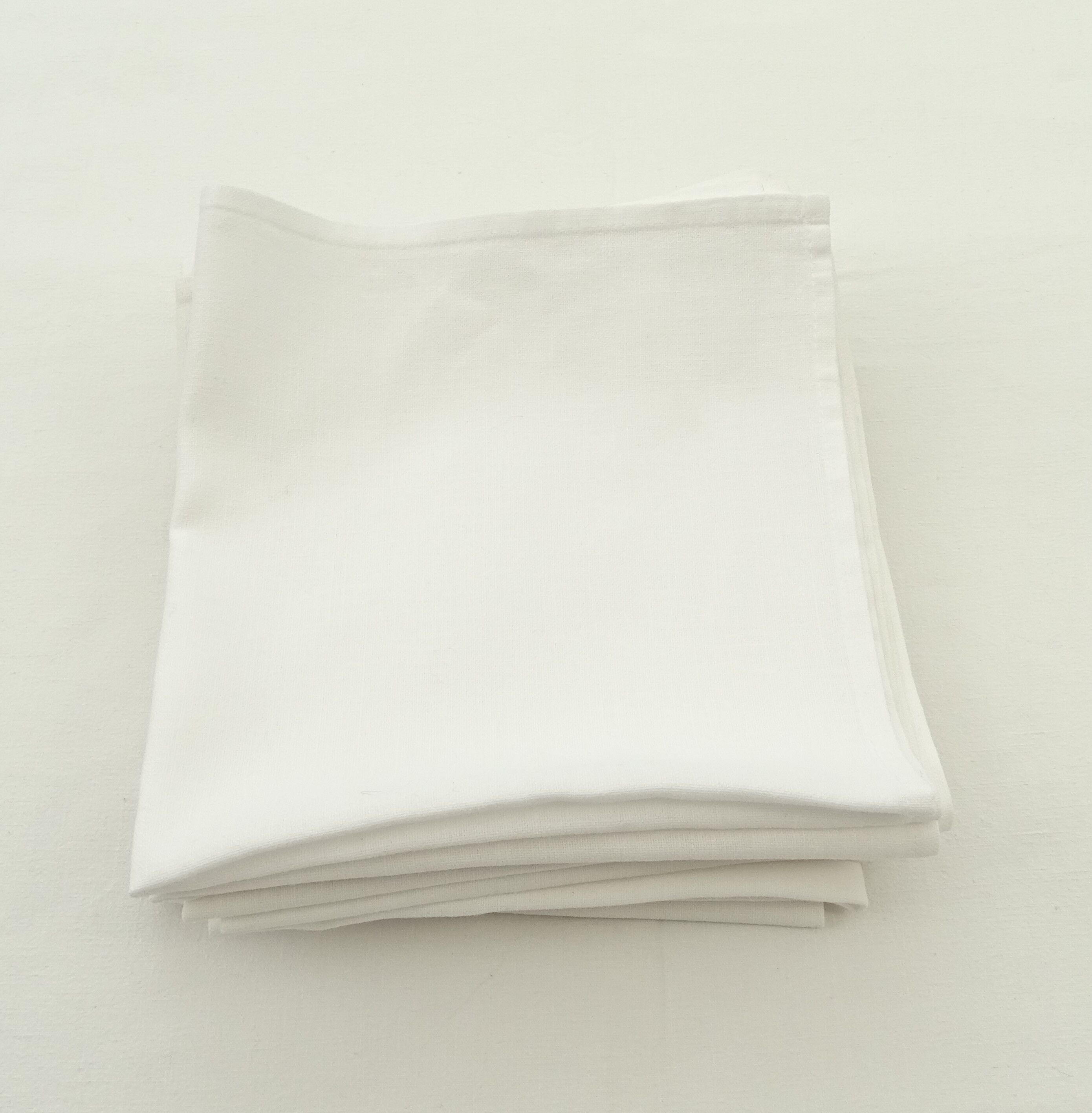 Set of 11 cotton napkins.