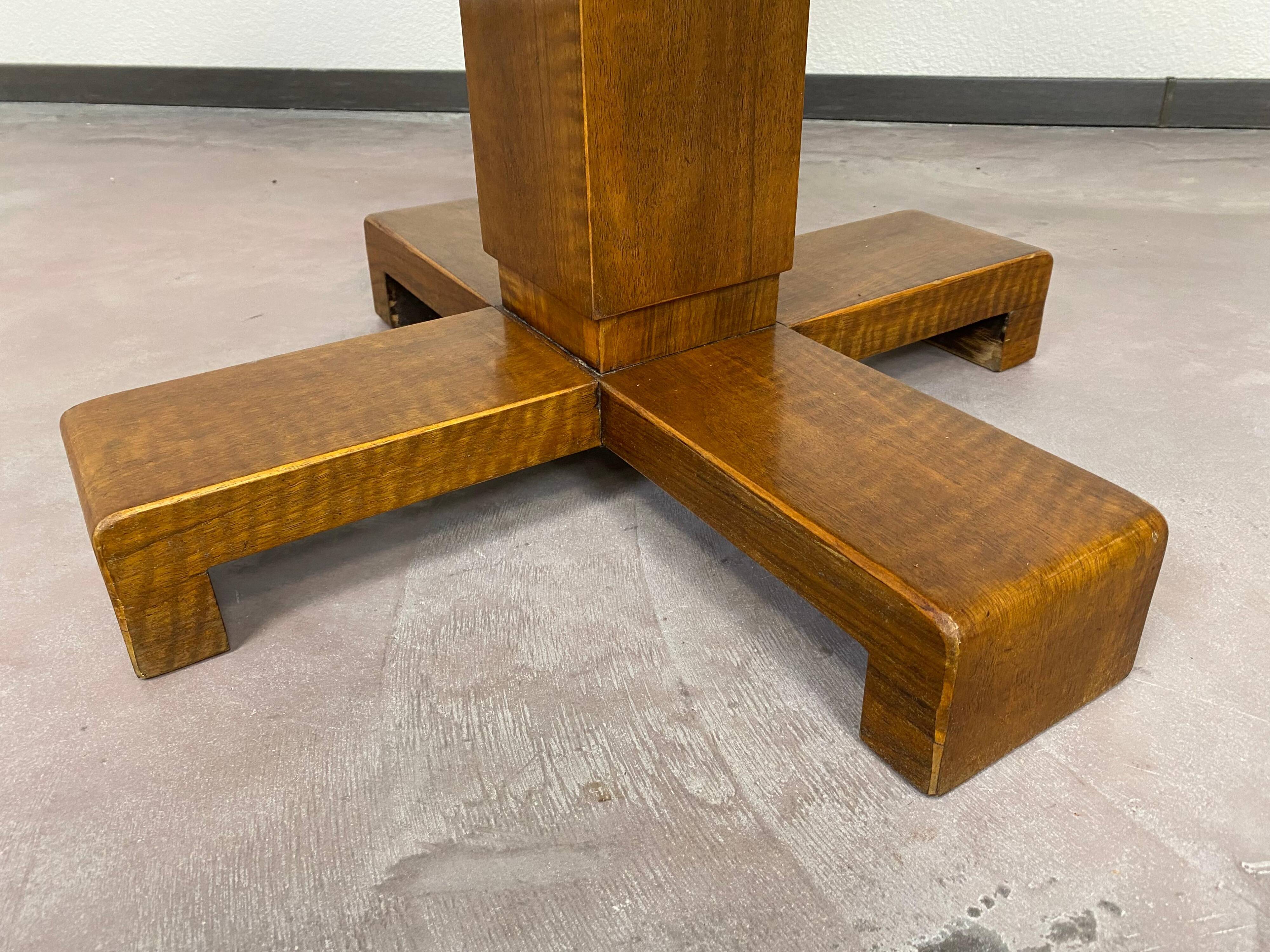 Art Deco game table with a black glass top.
