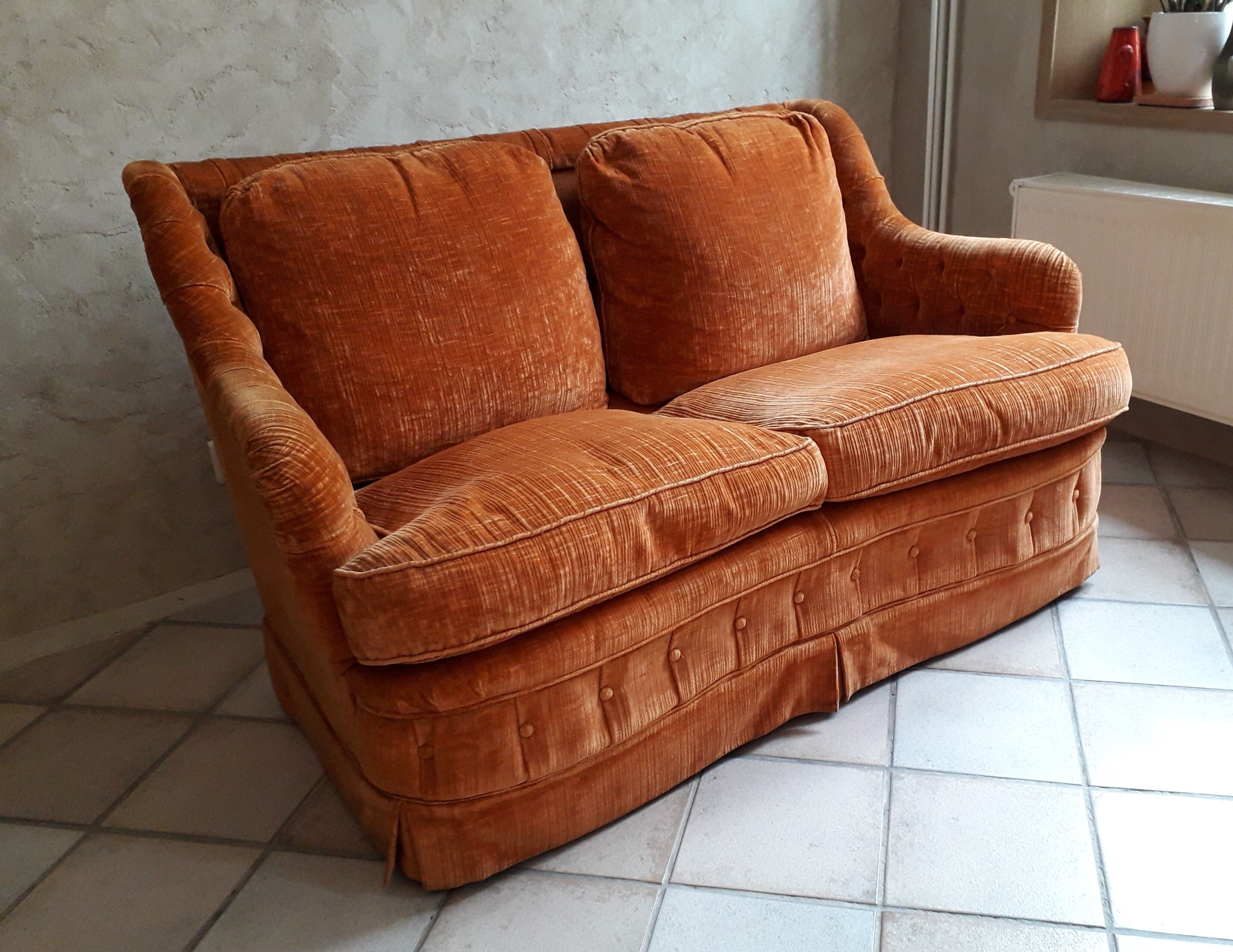 Orange velvet two-seat sofa