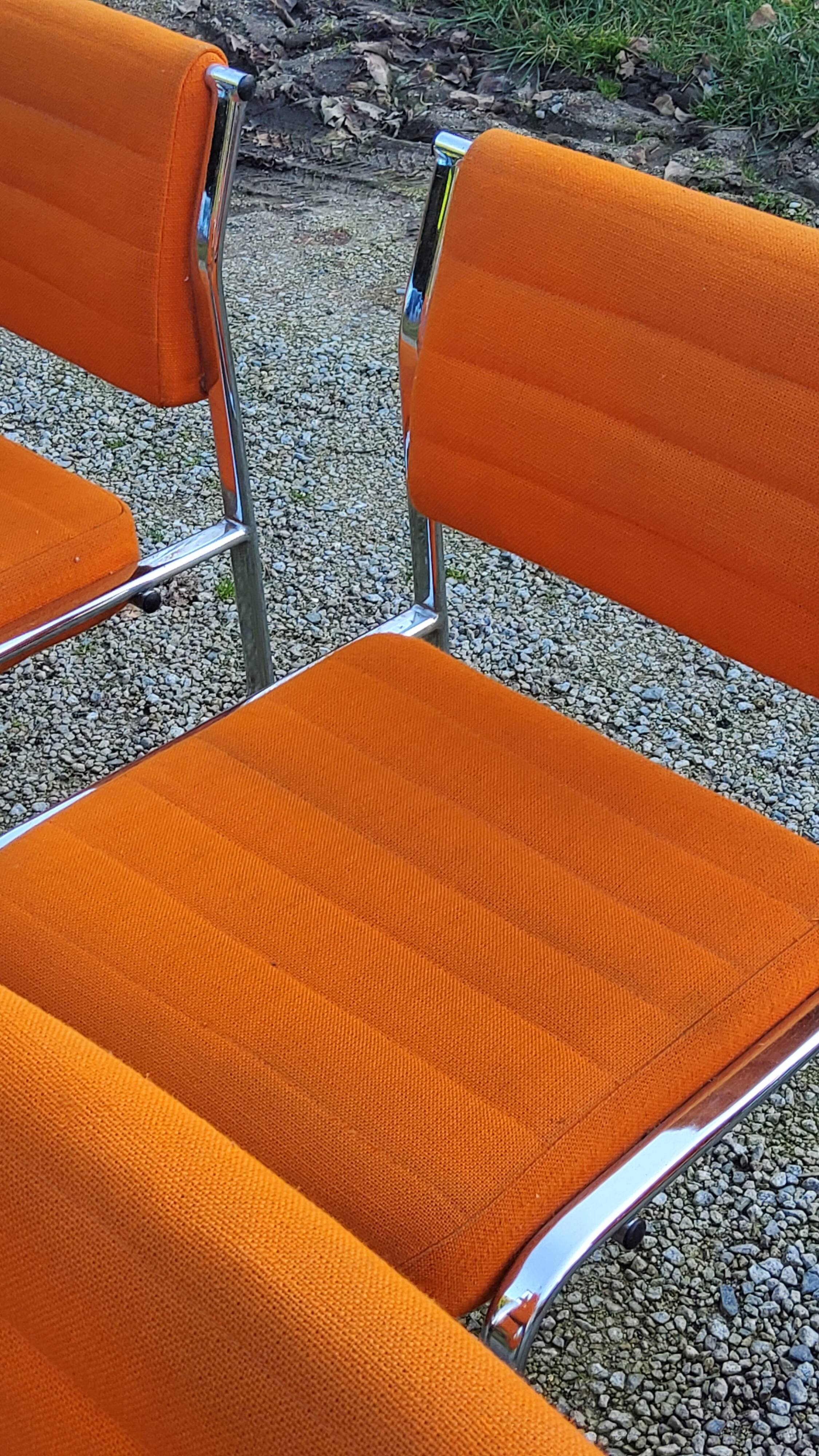 Set of 6 designer chairs from the 70s orange fabrics and chrome tubes