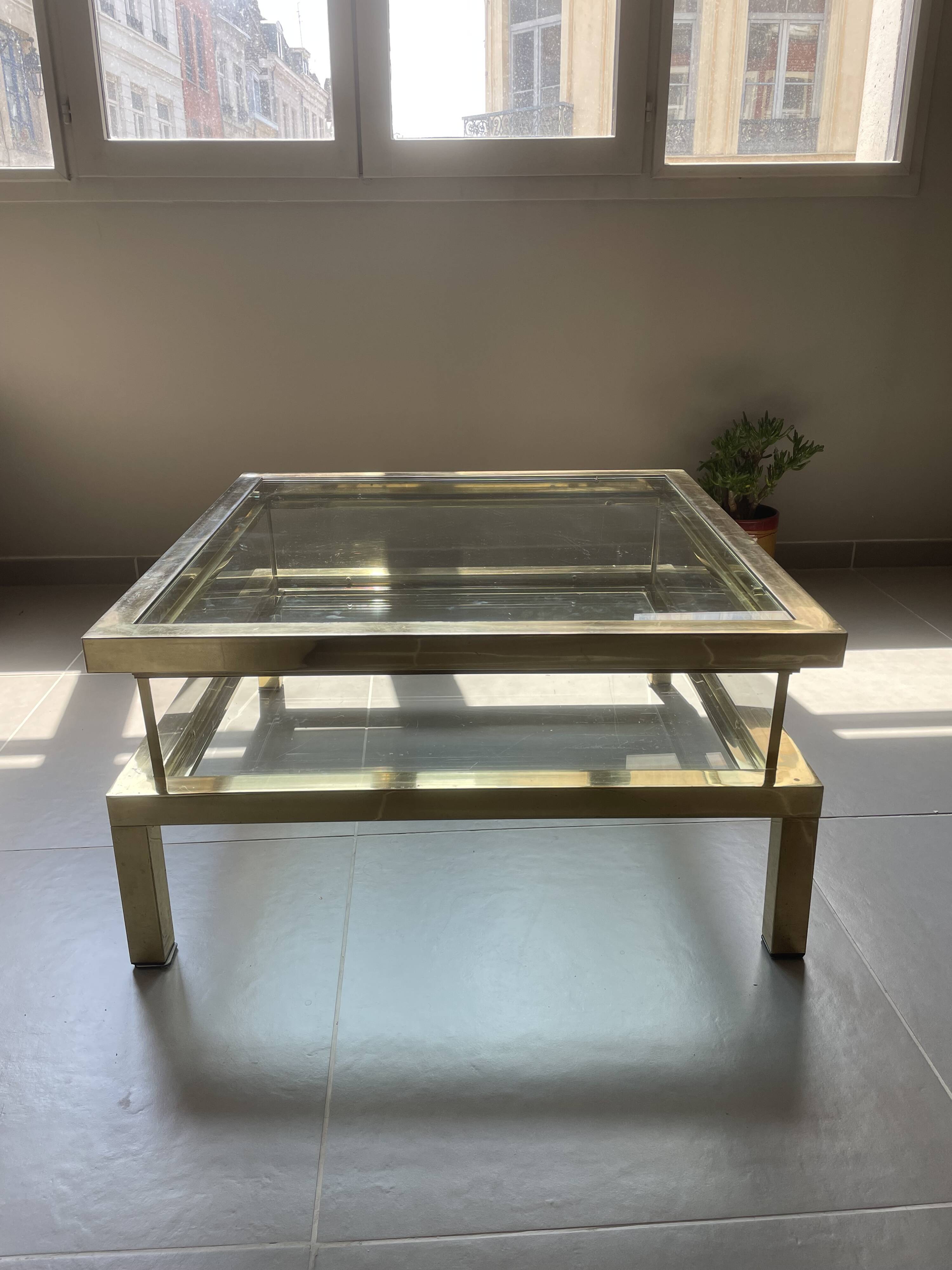 Vintage 1970s coffee table brass chrome Maison Jansen style with a top cover.