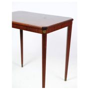 Side table decorated with bronze ornaments in light mahogany