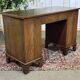 English desk from the 1950s in mahogany with a leather top.