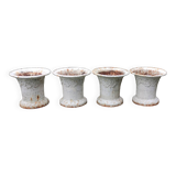 Série de 4 anciens cache-pots en fonte
