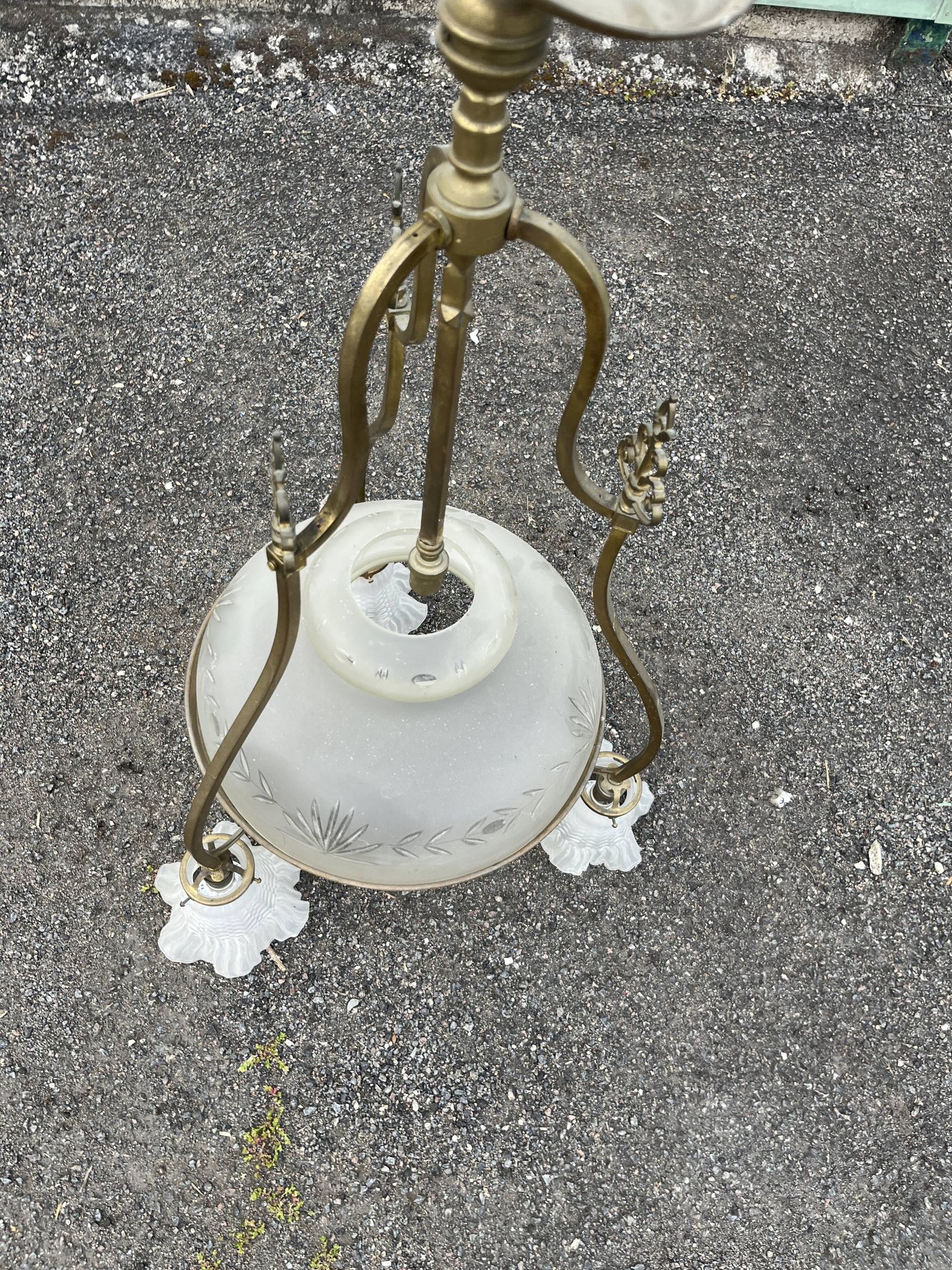 Antique brass chandelier with 3 lights and frosted glass shades.