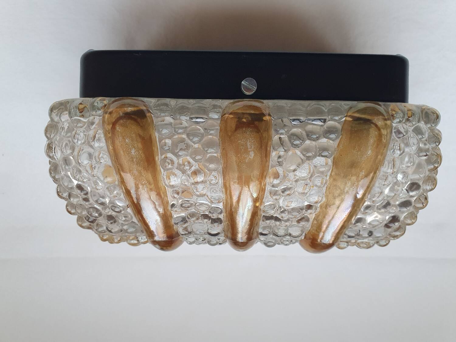 Bubble glass and amber wall light