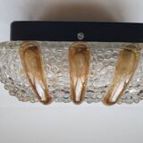 Bubble glass and amber wall light