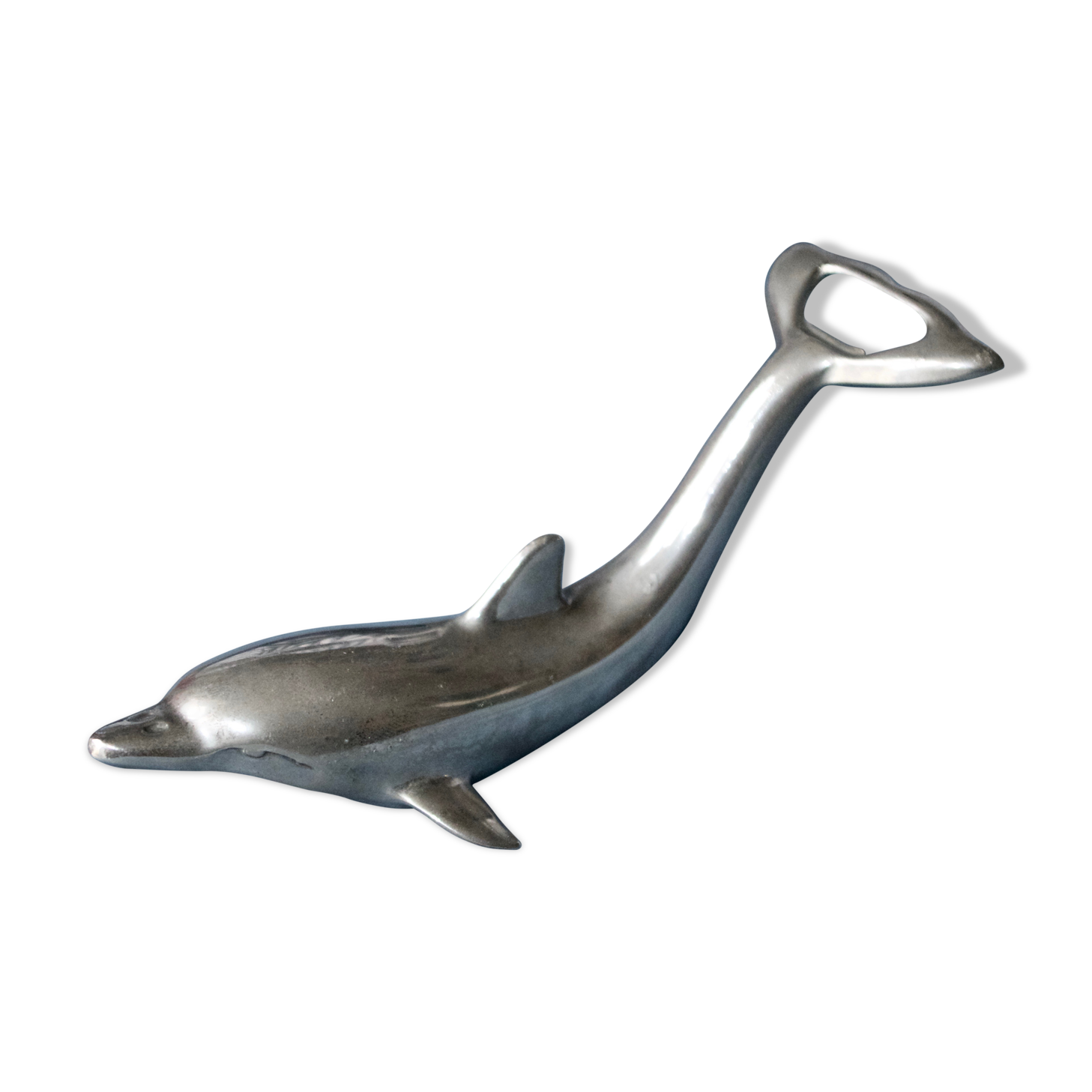 Vintage metal bottle opener dolphin