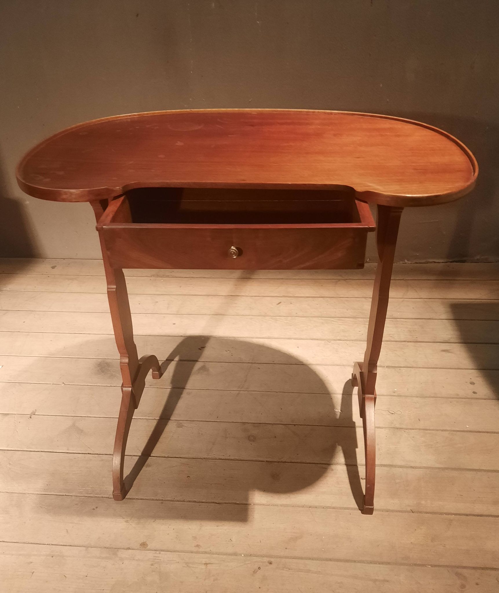 Kidney-shaped side table