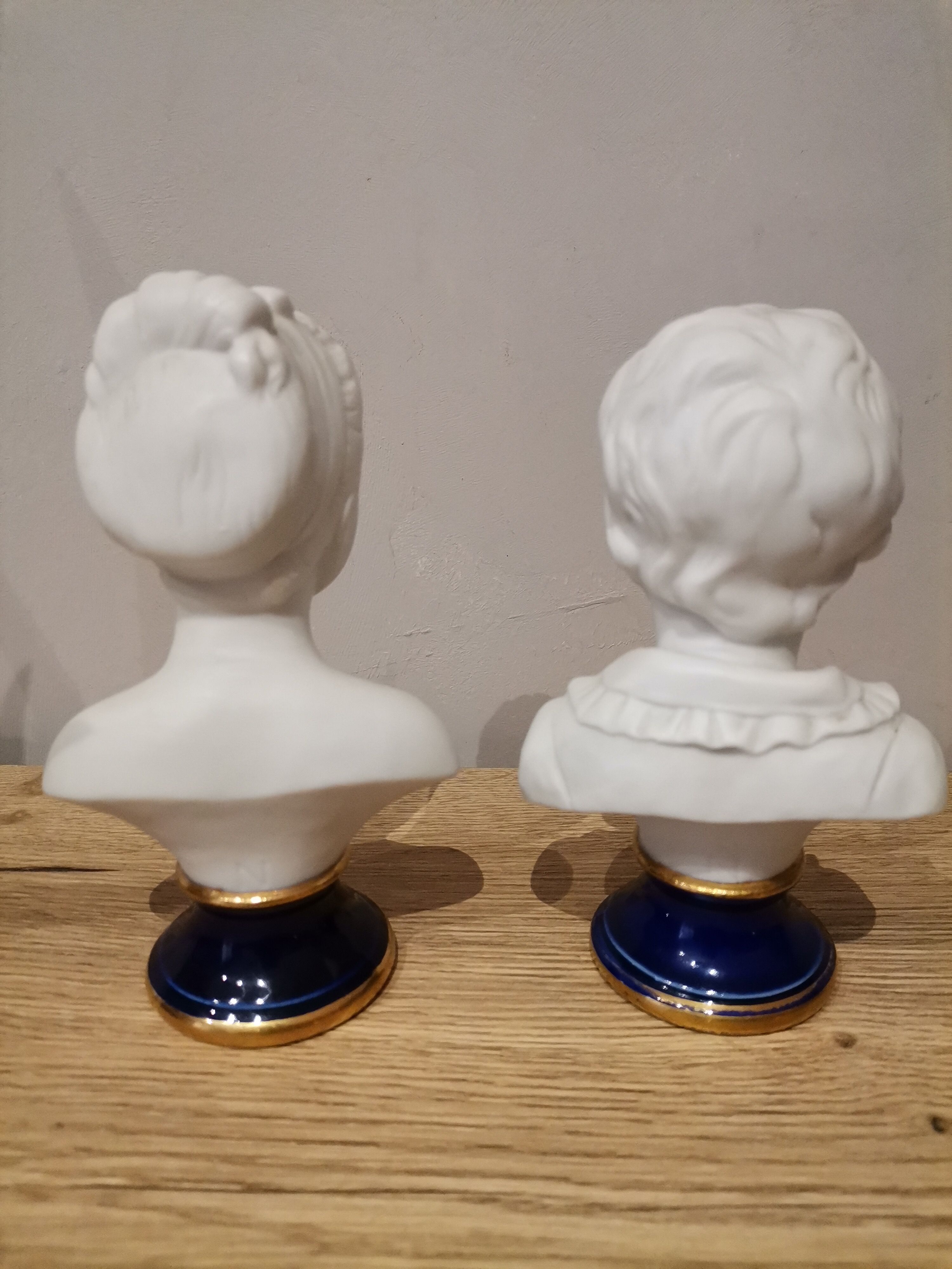 Signed children's busts