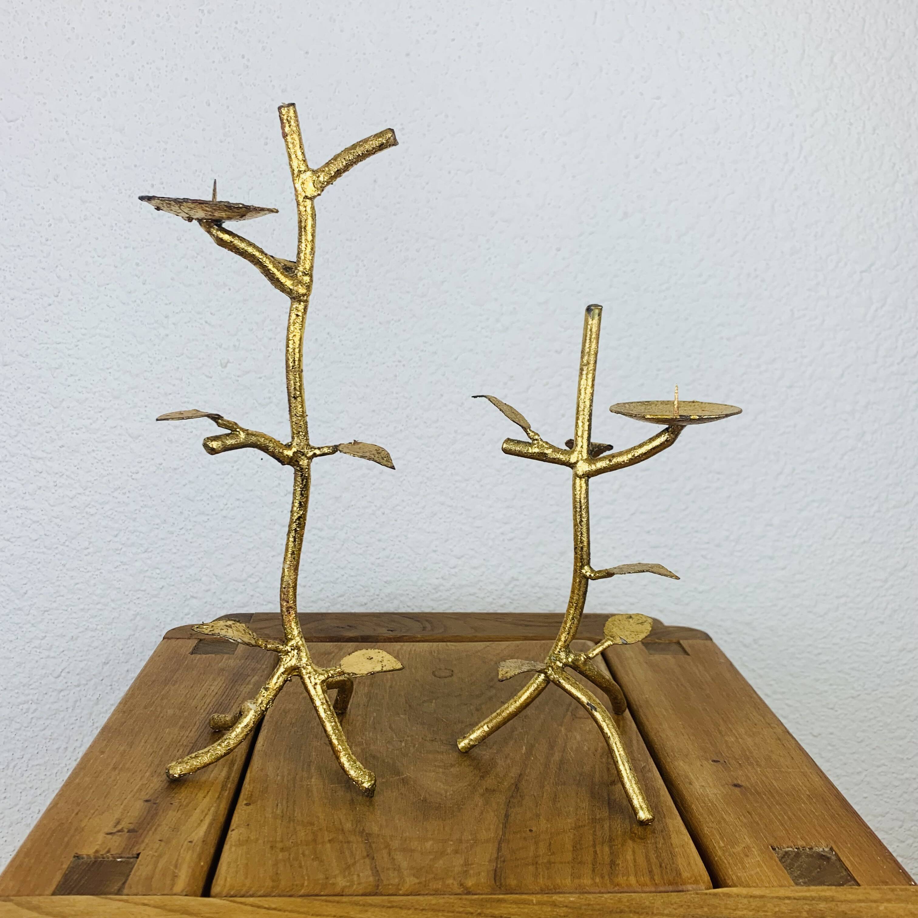 Pair of golden foliage candlesticks