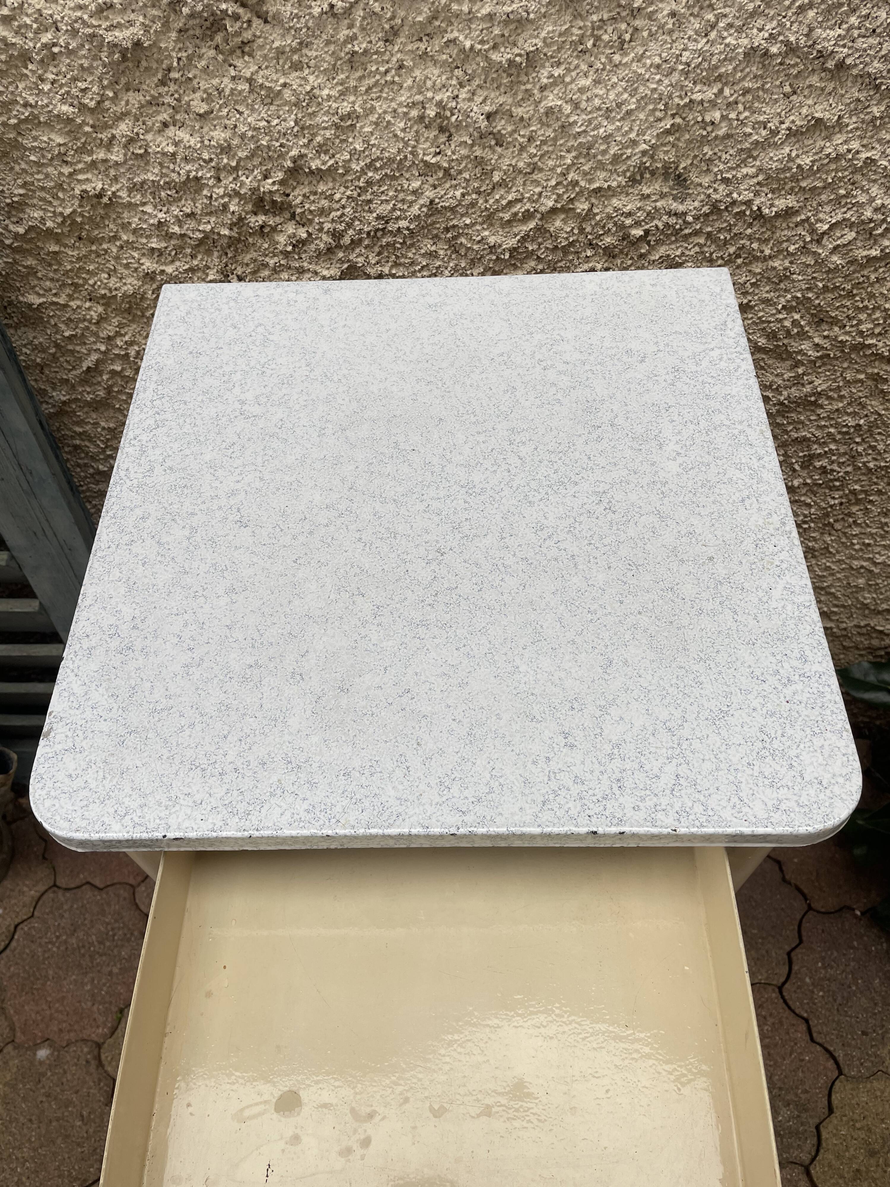 Furniture stored bottle in enamelled sheet metal