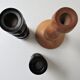 Three vintage light and dark wood candlesticks
