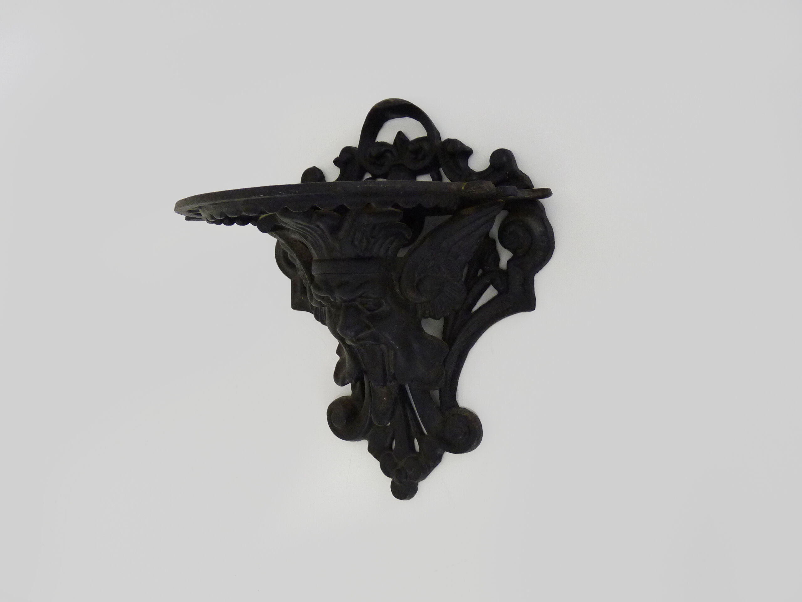 Harness, plant door, wall statue door with devil's head