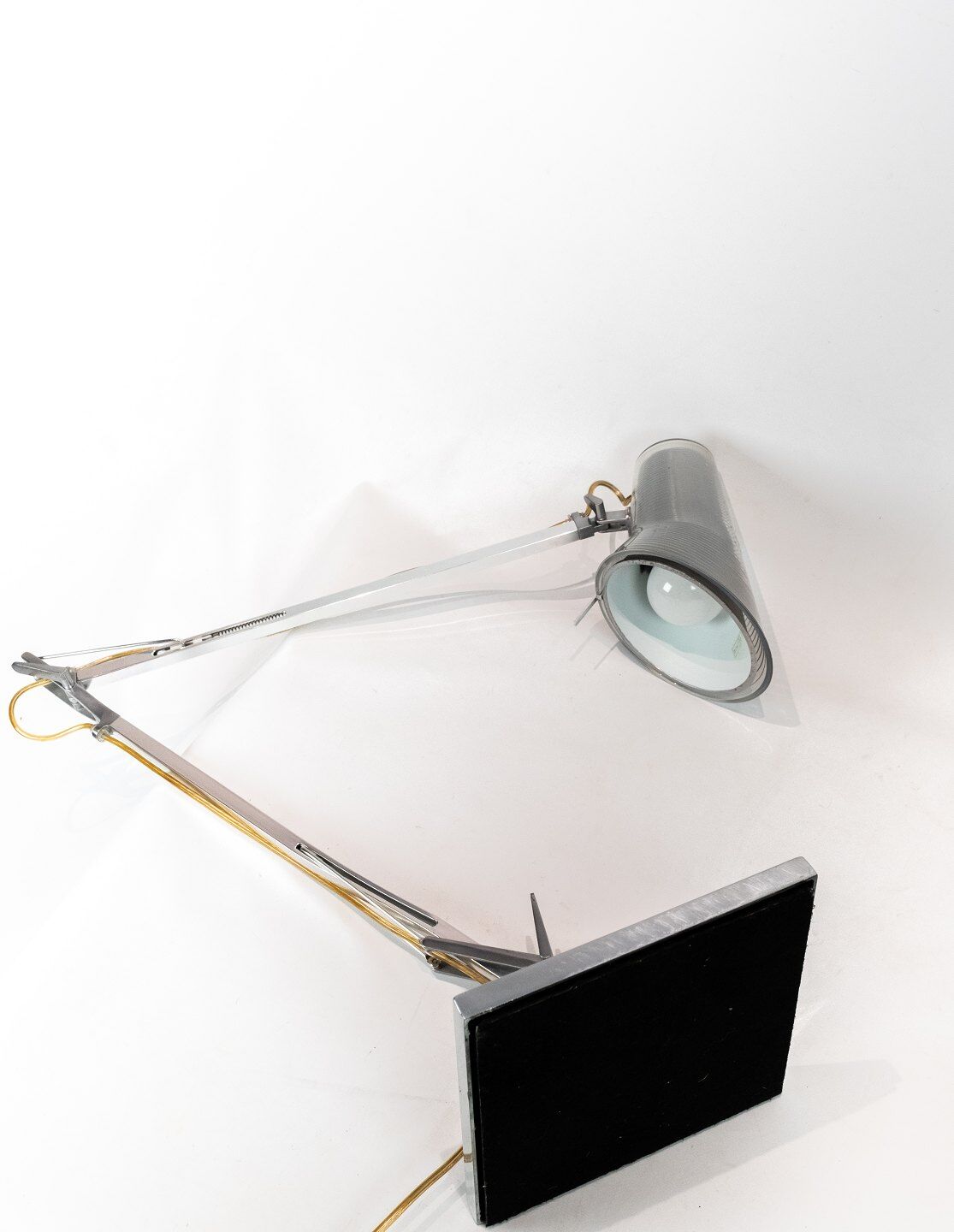 Table lamp of stainless steel and of italian design by Flos