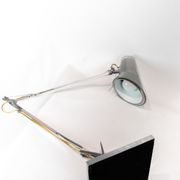 Table lamp of stainless steel and of italian design by Flos