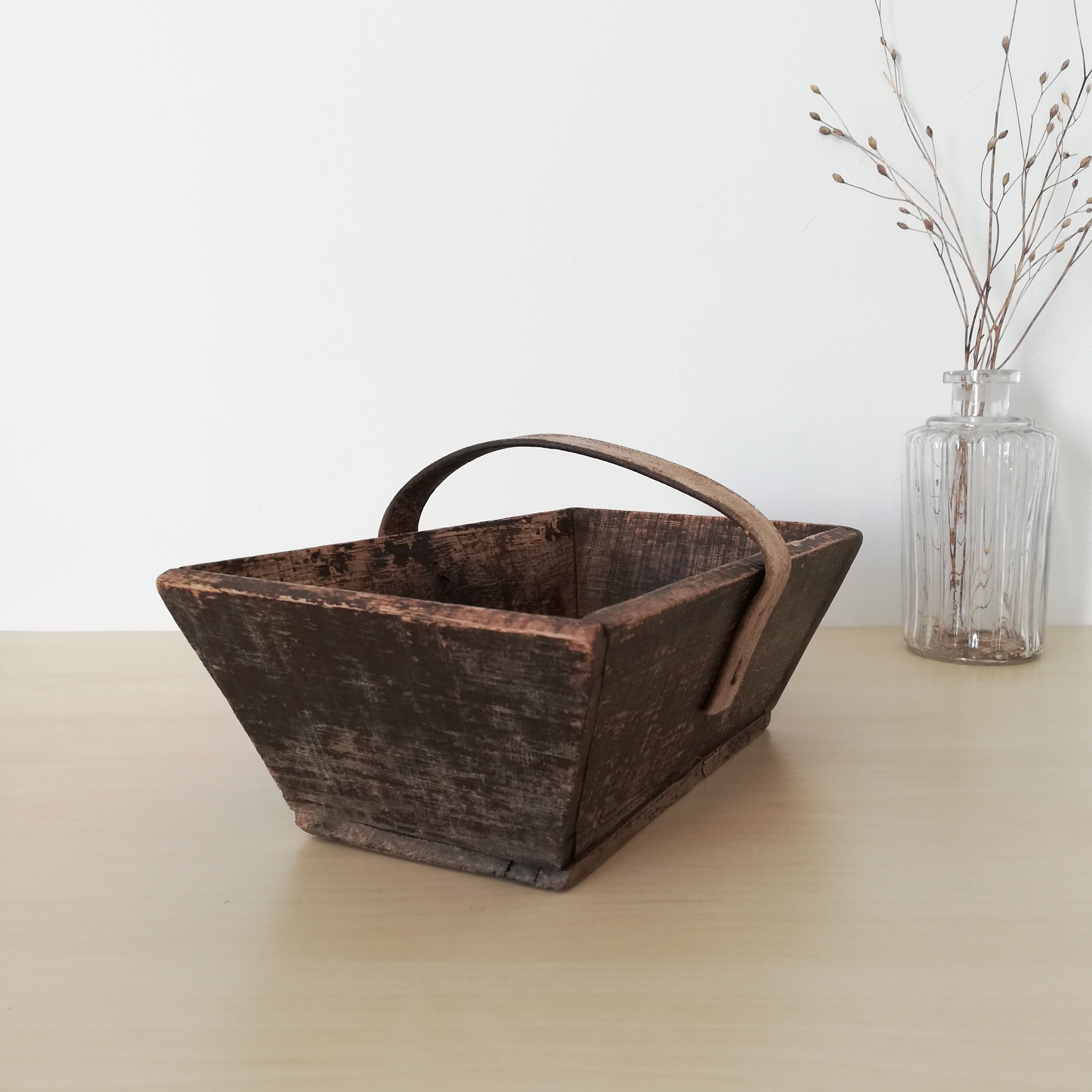 Dark wooden harvest basket