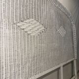 Vintage headboard in woven white rattan