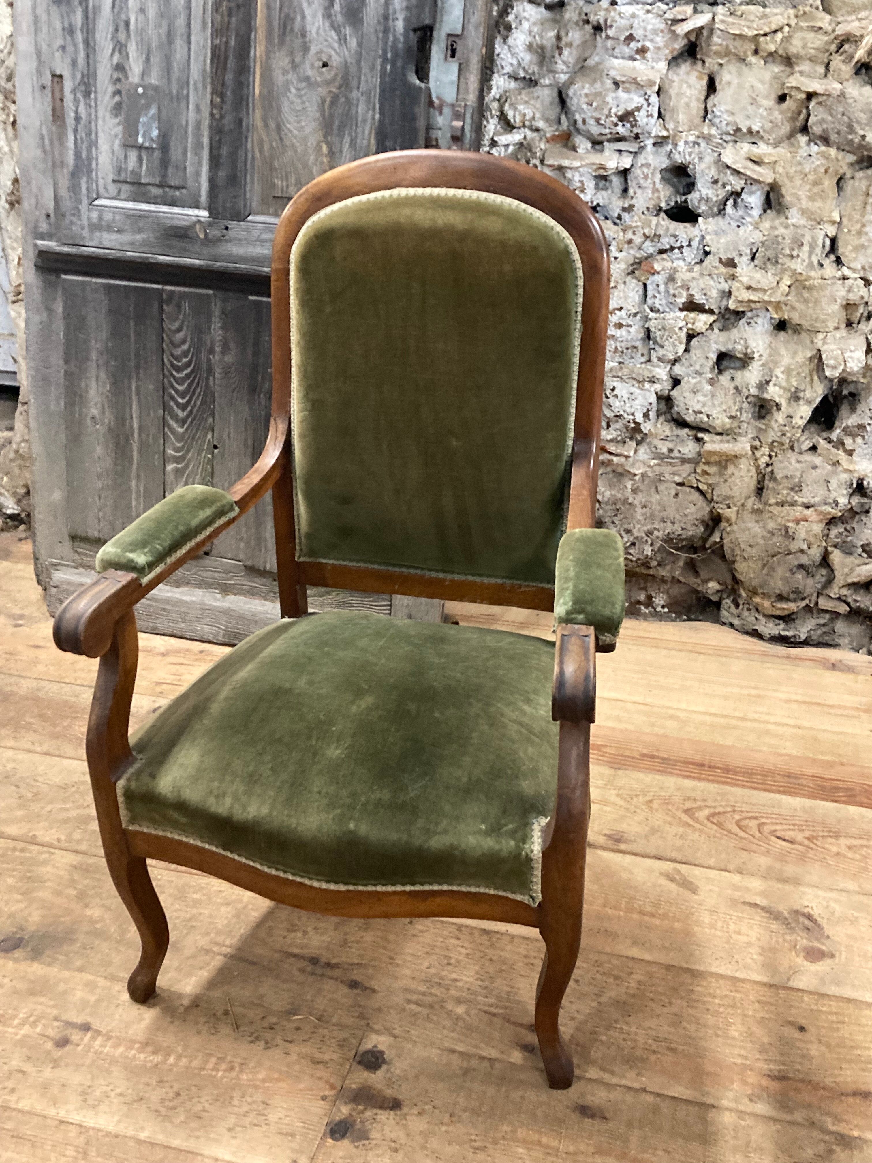 Antique Voltaire armchair in wood and green velvet Louis Philippe