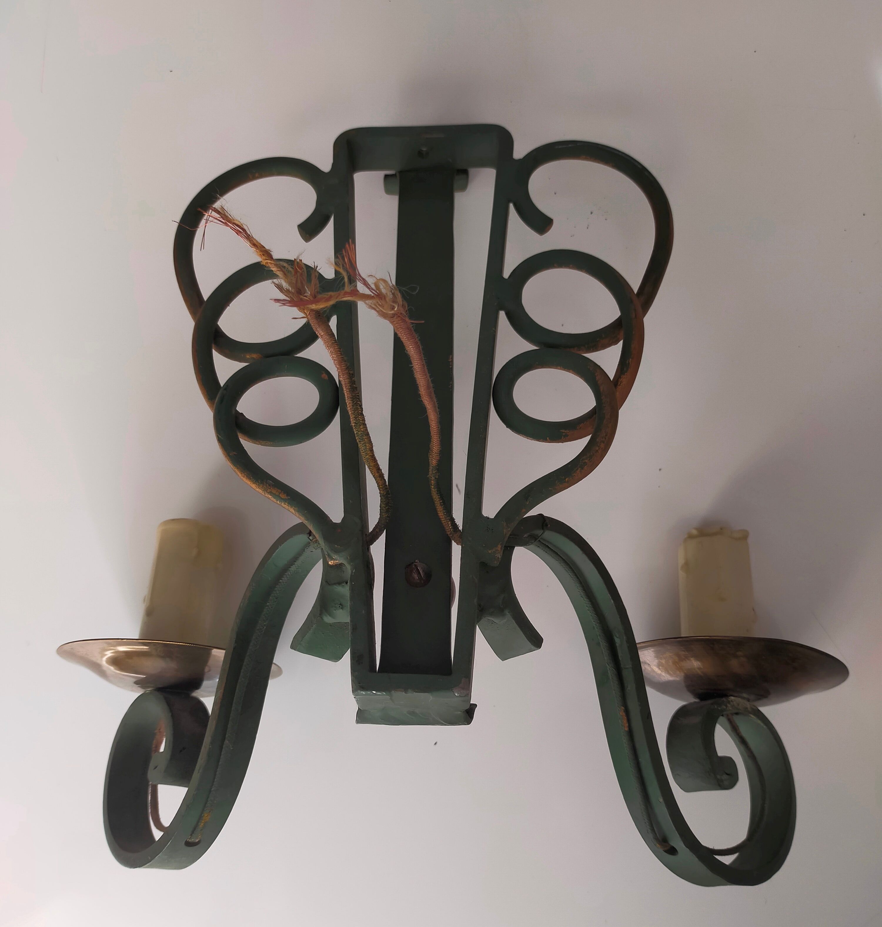 Pairs of vintage wrought iron wall lamps
