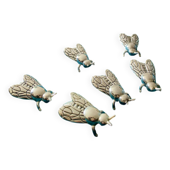 6 Bee-shaped knife holders, silver-colored metal