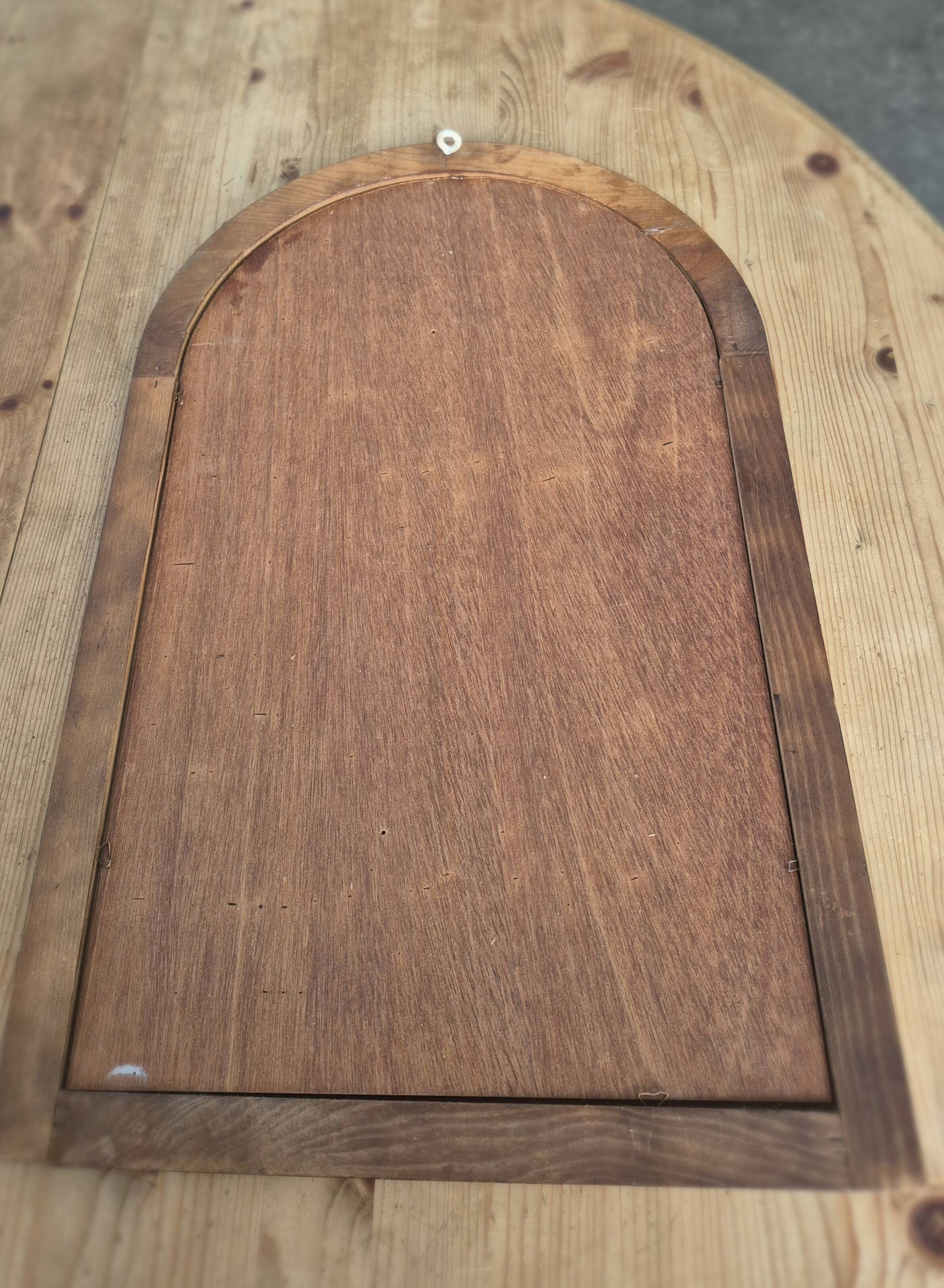 A pair of vintage stained glass style mirrors.