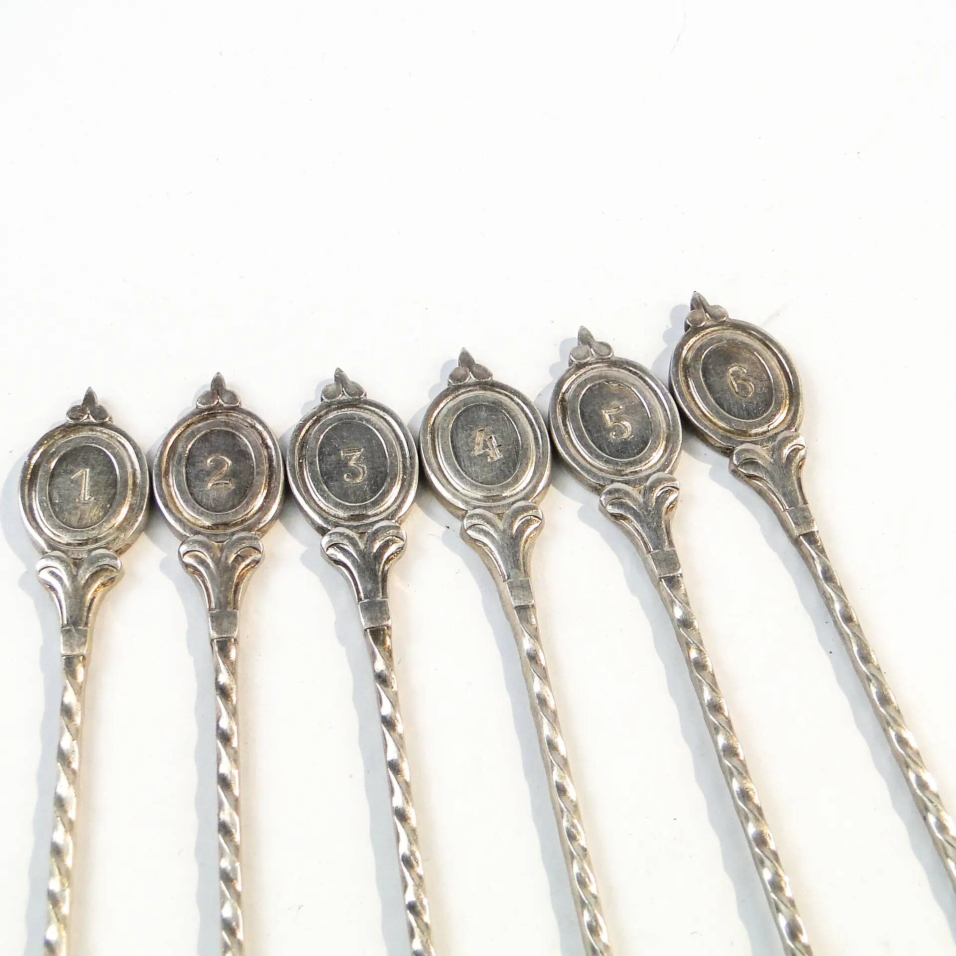 Set of neoclassical cocktail spoons, silver-plated brass, G.A.B., Sweden, 1930s